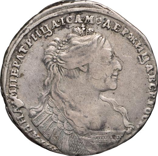 Anverso Poltina (1/2 rublo) 1736 "Tipo 1735" Sin medallón en el pecho Cruz del orbe contiene un patrón - valor de la moneda de plata - Rusia, Anna Ioánnovna