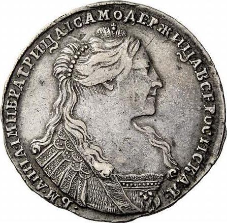 Anverso Poltina (1/2 rublo) 1737 "Tipo 1735" Con medallón en el pecho Cruz del orbe contiene un patrón - valor de la moneda de plata - Rusia, Anna Ioánnovna