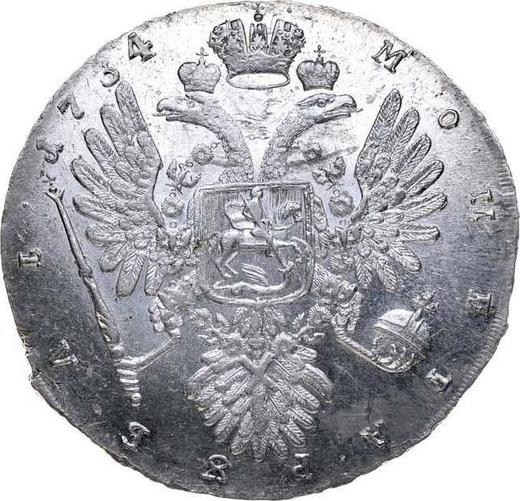 Реверс монеты - 1 рубль 1734 года "Лирический портрет" Большая голова Корона разделяет надпись Дата слева от короны - цена серебряной монеты - Россия, Анна Иоанновна