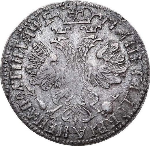 Reverso Poltina (1/2 rublo) ҂АΨE (1705) "Retrato del trabajo de F. Alexeev" En la base de la corona hay dos rizos - valor de la moneda de plata - Rusia, Pedro I