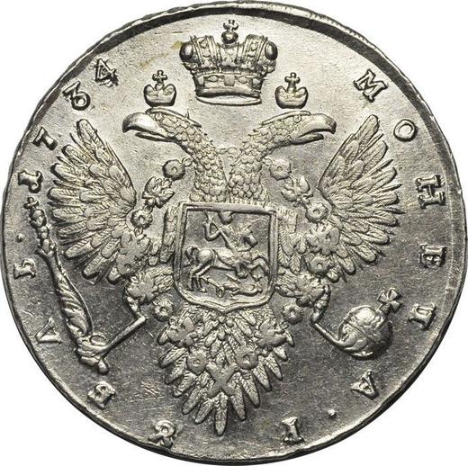 Reverso 1 rublo 1734 "Corsé es paralelo al círculo." Con broche en el pecho - valor de la moneda de plata - Rusia, Anna Ioánnovna