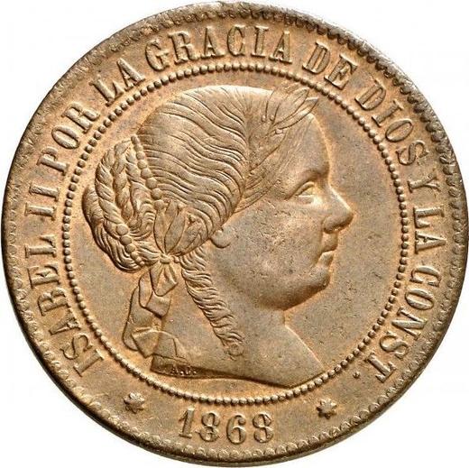 Аверс монеты - 5 сентимо эскудо 1868 года OM Семиконечные звёзды - цена  монеты - Испания, Изабелла II
