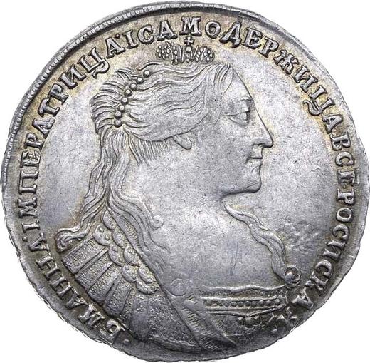 Anverso Poltina (1/2 rublo) 1737 "Tipo 1735" Con medallón en el pecho Cruz del orbe es simple - valor de la moneda de plata - Rusia, Anna Ioánnovna